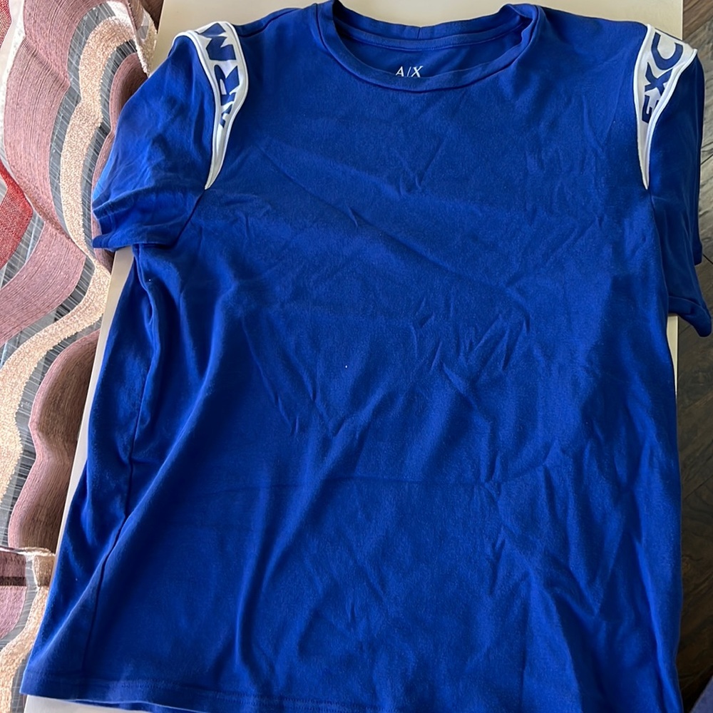 Armani Exchange T-shirt. Used but in good condition . Great for warm weather